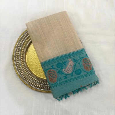 Cotton Plain Saree with Woven Border — Sky Blue — Aarambh — draped, standing