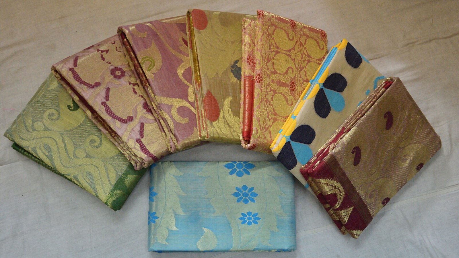 Tussar silk sarees on display at a handloom market
